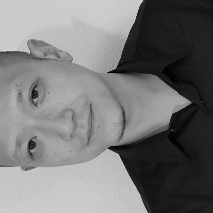 Rudy Chou portrait against a dark gradient background